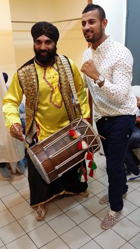 Garry Sandu with Suki perform the Bhangra Dhol in Malaysia