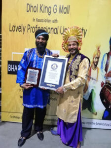 Master Suki from The Dholiz Malaysia with King G Mall at Lovely Professional University for the Bhangra World Record